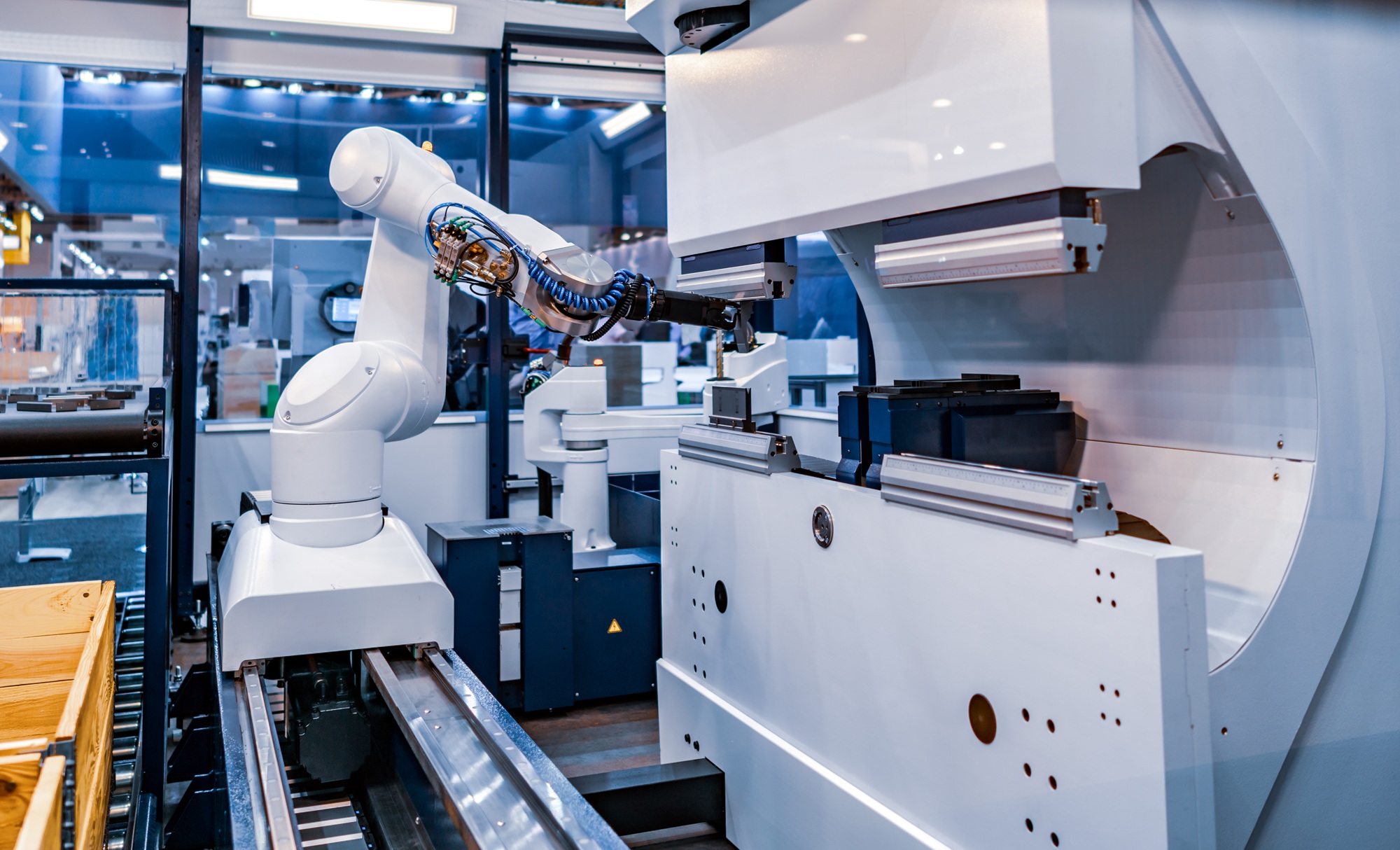 Industrial robotic arm operating on an automated manufacturing line